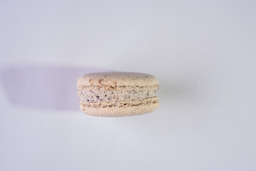 This is a French cookie called a macaron. It is two cookies made with meringue and cream sandwiched...