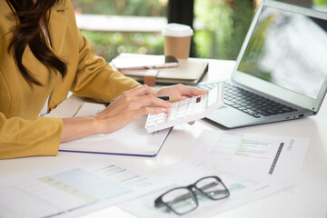 Business finance woman calculating budget numbers, Invoices and financial adviser working.