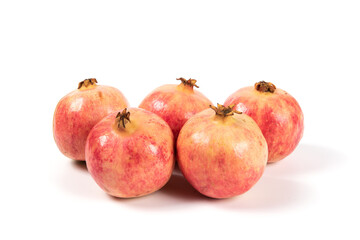 whole pomegranates isolated on white background.