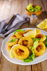 Calamari Rings with Lettuce and Lemon – Fresh and Crispy Seafood Dish