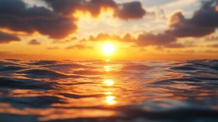 Obraz premium Sunset’s warm glow softly rests upon the quiet ocean.