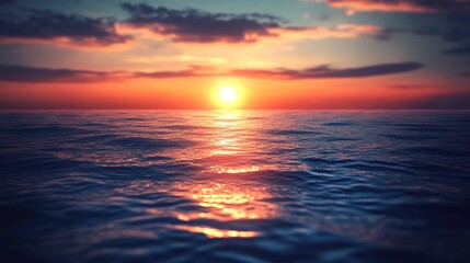 Obraz premium The ocean's calm mirrors the golden hue of sunset.