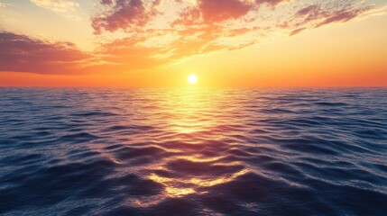 Fototapeta premium Golden waves dance quietly beneath a setting sun.