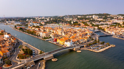 Obraz premium Drone view of the administrative center of the city of Martigues, located on the Mediterranean coast, in the south-east of ..France