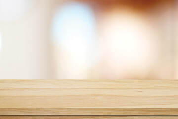 Empty wood table top, counter, desk background over blur  bokeh background, Wooden table, shelf and blurred kitchen restaurant for food, product display mockup, template