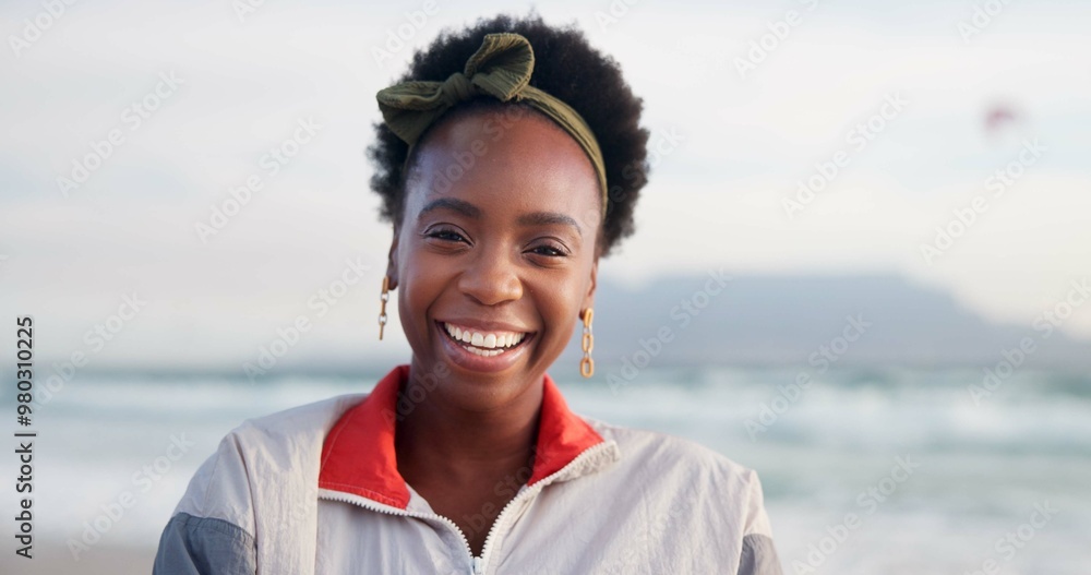 Poster Happy, laugh and portrait of black woman at beach for summer vacation, holiday and weekend in nature. Travel, smile and face of person by ocean, sea and outdoors for adventure, relax and fun in USA