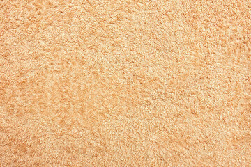 Detailed pattern of a soft beige towel texture. This image can be used for background, website, or print design