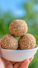 A healthy and delicious snack, these energy balls are made with natural ingredients like nuts, seeds, and honey.
