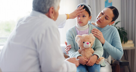 Woman doctor, child and check fever at hospital, pediatrician and sick girl for assessment. Mature nurse, helping kid and touching head for physician examination, health and parent support at checkup