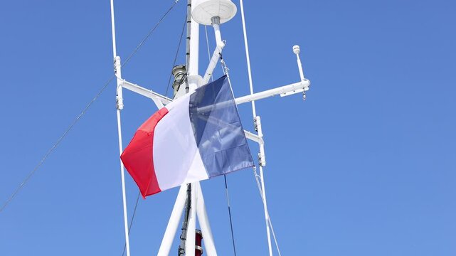 French Flag Waving on Ship Mast
