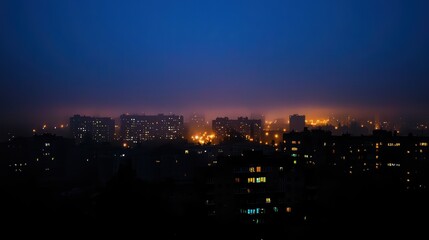 Shadowy Urban Landscape Wallpaper. A dark urban skyline at night.
