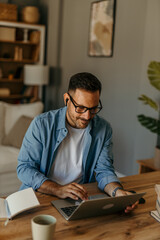 Happy Male Using Computer For Rest, Study Or Education, Typing On Keyboard, Surfing Internet