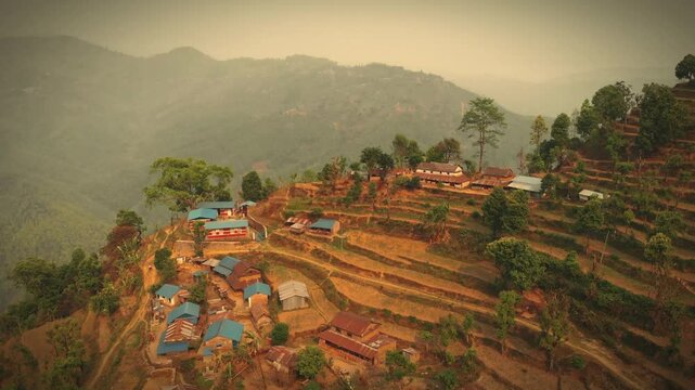 Aerial view of Simle Village of Gorkha Nepal, Himalayas on Background