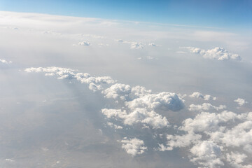 Obraz premium View of Clouds from Jet Window at 10 Kilometers Altitude