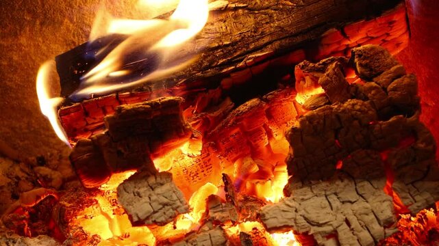 A detailed view of the structure of a log burning in a stove