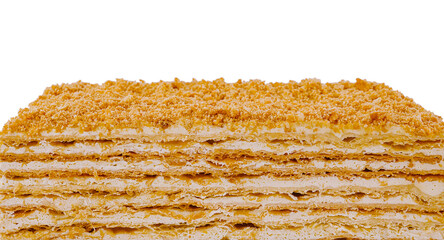 Delicious multi layered napoleon cake with crumb topping isolated on white background