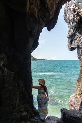 Woman Enjoying Summer Vacation, blue sky background. Travel and lifestyle Concept