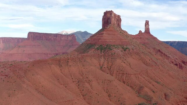 Large Natural rock formation, Parriot Mesa in Utah desert, Moab. Aerial orbiting shot.
