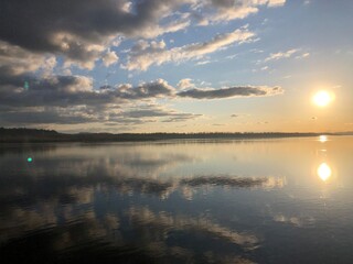 View of a sunset over the Columbia River with clouds reflecting off the water
