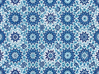 Repeating abstract geometric shapes in shades of blue and white create a dynamic seamless pattern ideal for textiles, wallpaper, and design backgrounds.
