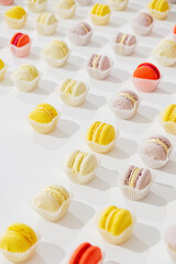 Macarons design on white background top view space