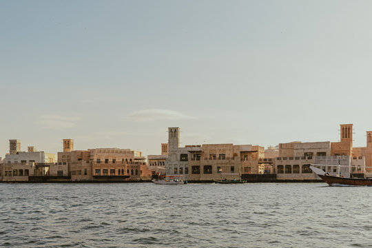 Dubai, UAE - January 6, 2020: Traditional wind tower architecture along Dubai Creek waterfront