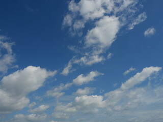 Naklejka premium Cumulus cloud on beautiful blue sky in day light , Fluffy clouds formations at tropical zone