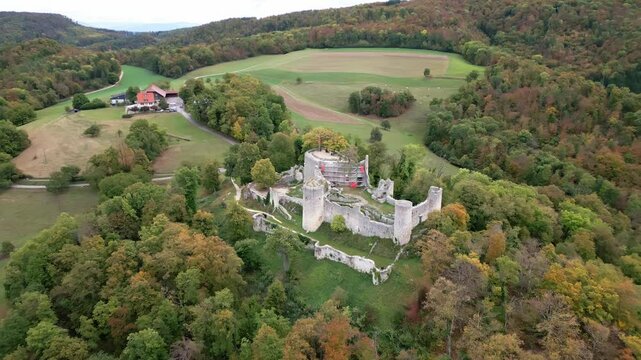 Push out drone shot of Dorneck's ruins in Dornach, Switzerland in the canton of Soleure.