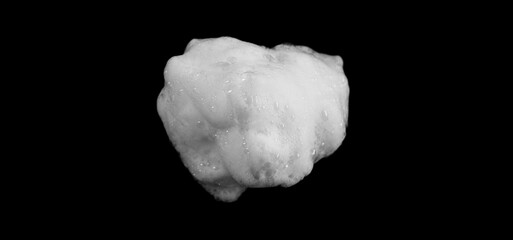 White soapy foam texture. Shampoo foam with bubbles.White facial foam creamy bubble soap sponge isolated on black background.