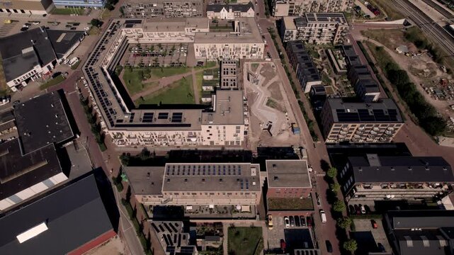 Aerial top down street plan and park view of Noorderhaven residential infrastructure in Dutch city Zutphen.
