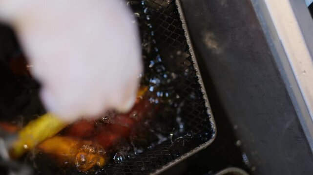 Golden Fries Sizzling in the Fryer