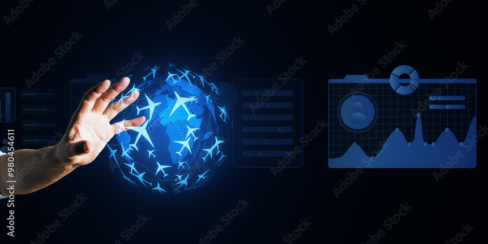 Poster close up of businessman hand using glowing blue airplanes sphere and business graph on dark backgrou