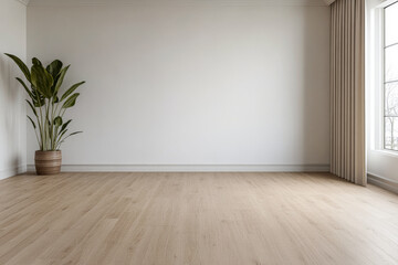 Bright and airy living room with a large window, potted plant, and light wooden floor during daytime