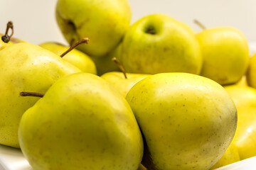 Ripe Apples on a White Tray - Side View