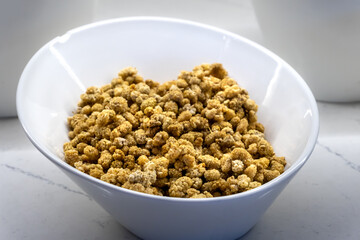 Dried Mulberries on a White Plate - Side View