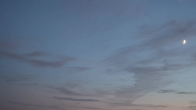 Clouds At Twilight And The Moon