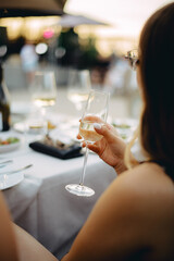 Wine tasting. Sommelier pours wine into a glass