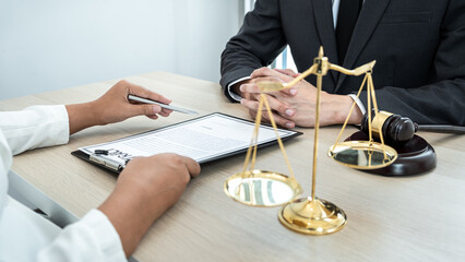 Male lawyer or notary working consulting and discussion to businesswoman client in the office, Law...