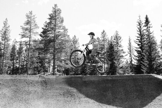 boy biking on a bike track in Trysil Norway