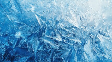 Frosty blue ice texture with intricate crystalline patterns, evoking the chill of winter, perfect for seasonal designs Close-up photo with clean background