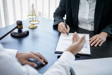 Male lawyer or notary working consulting and discussion to businesswoman client in the office, Law and Legal services concept
