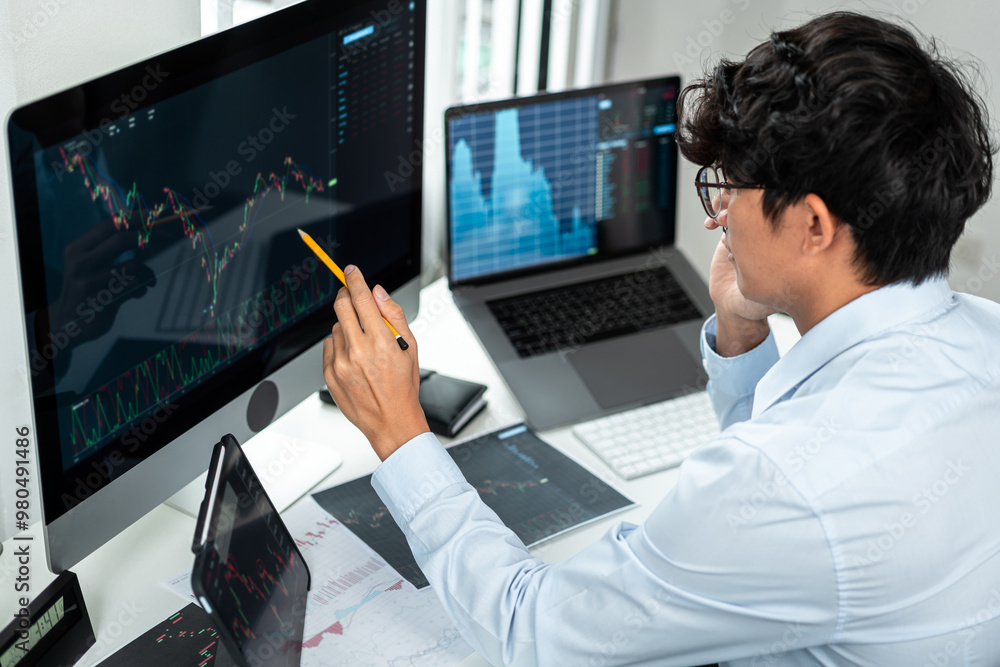 Poster businessman investor working with computer, tablet and analyzing graph stock market trading planning