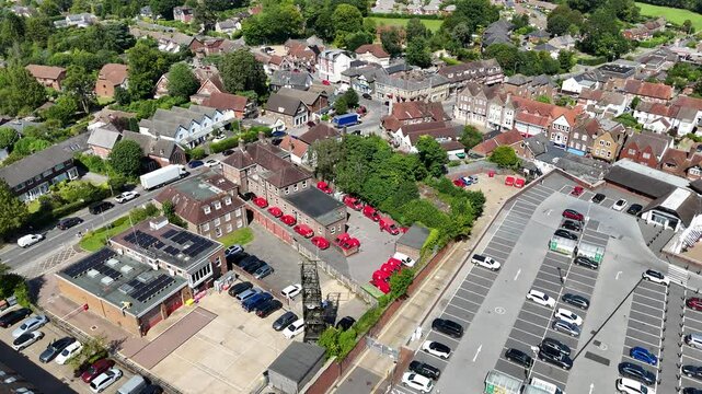 Red vans parked Post office yard Crowborough town in Kent UK drone,aerial