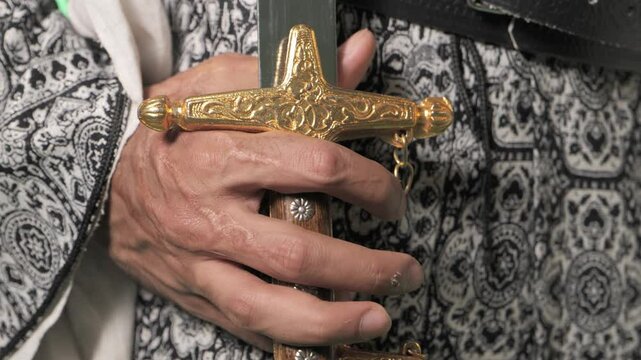 Traditional Saudi out-feet on chromakey. Arabian long saber - saif.