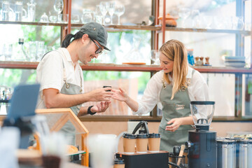 Obraz premium Vintage Barista Crafting Perfect Espresso at Charming Cafe, Hot Drinks Like Cappuccino Latte Served in Cups, Professional Precision Aroma Filling the Morning, Brown Beverage Warms Customers in Cozy