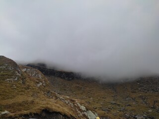 Romania, mountains, gorges, forest, slope, pine trees, serpentine, rocks, stones, travel, autumn, road, highway, recreation, houses, architecture, antiquity, mood, monument, bas-relief, clouds