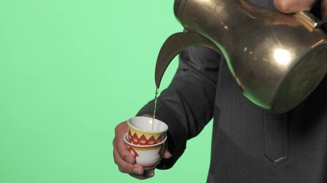 Traditional Saudi out-feet on chromakey. Arabian dalla coffee kettle.