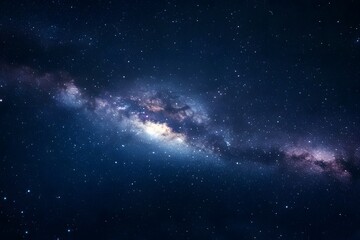 Fototapeta premium A dark night sky with stars and the Milky Way galaxy in view. 
