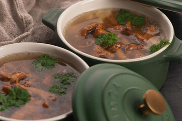 Soup with chanterelle mushrooms close up