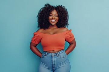 Beautiful plus size model smiling with hands in pockets